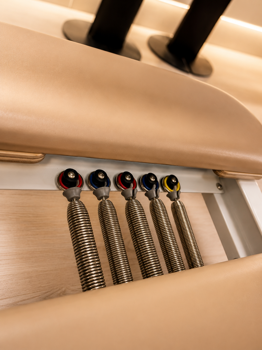 Close detail of the colour-coded springs beneath a Solhaus reformer